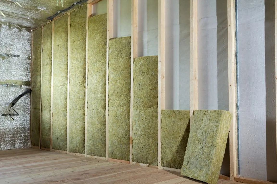 Mineral wool batt insulation installed between wall studs